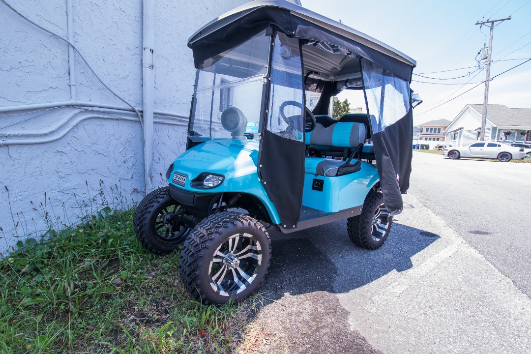 Electric golf cart available for guests of The Coastal Crown Penthouse